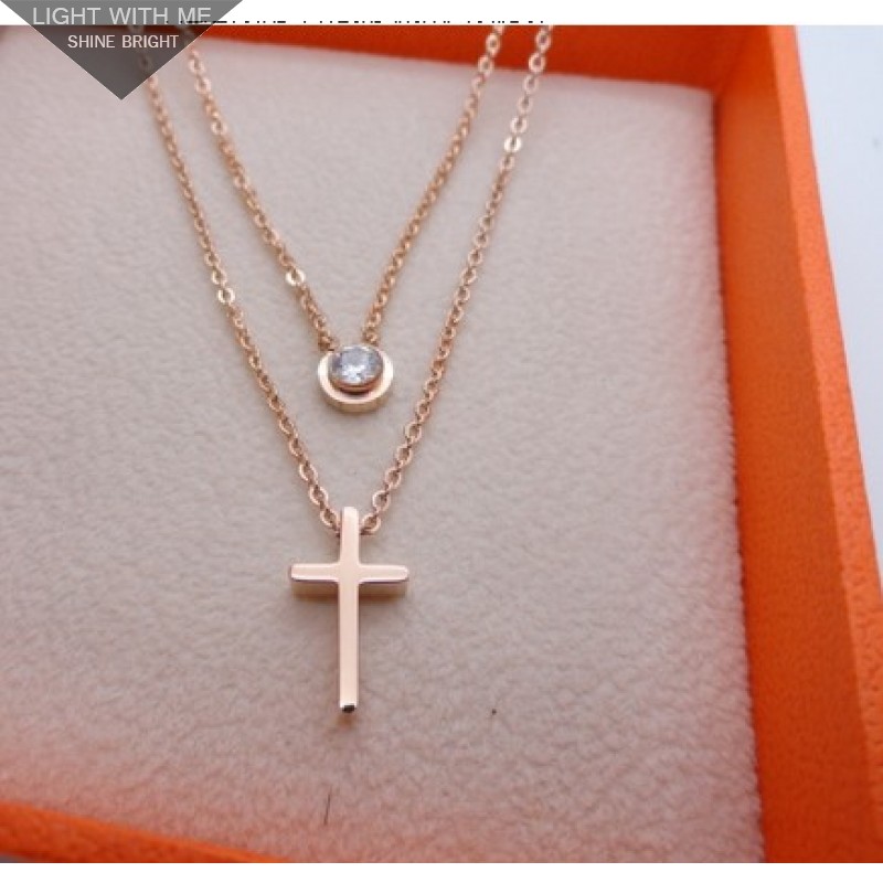 Cartier Cross Charm Necklace in 18kt Pink Gold With A Diamond