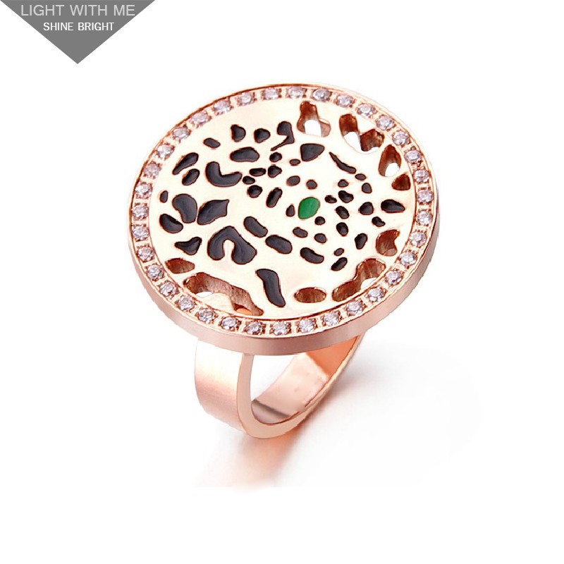 Cartier Panthere Ring in 18K Pink Gold Set with Diamonds, One Tsavorite Garnet Eye and Black Lacquer Spots