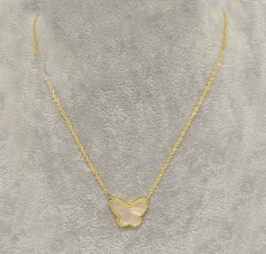 Van cleef & Arples white shell Butterfly in yellow glod necklace