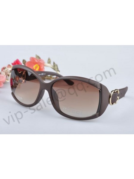 Gucci medium dark brown frame sunglasses with GG detail