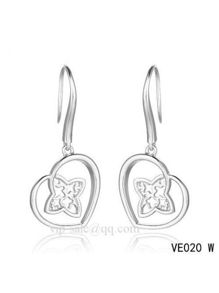 Louis Vuitton heart earrings in white