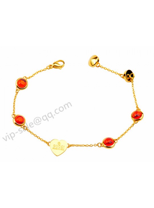 Gucci with 4 red diamond bracelet in yellow gold