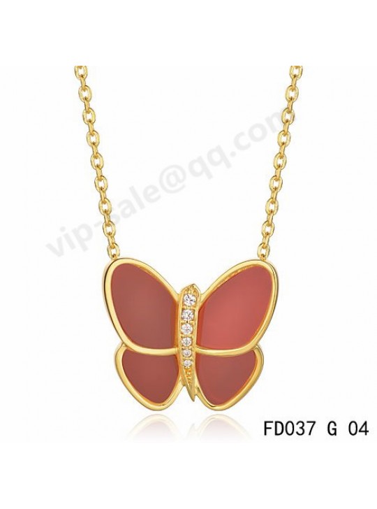 Van cleef & arpels Butterfly pendant in yellow gold with pink coral and round diamonds