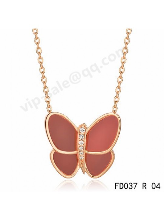 Van cleef & arpels Butterfly pendant in pin gold with pink coral and round diamonds