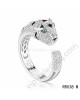 Cartier panther motif ring in white gold with diamonds emerald