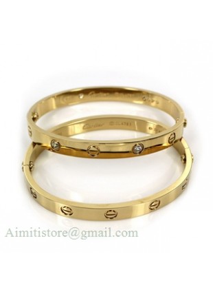 Cartier LOVE Bracelet in 18k Yellow Gold With 4 Diamonds