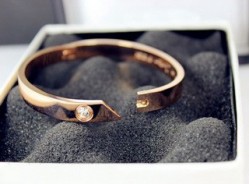 Cartier LOVE Bracelet in 18k Pink Gold with a Diamond