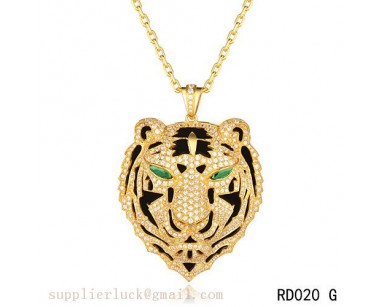 Panthere de Cartier Leopard head pendant in yellow gold with emeralds and diamonds