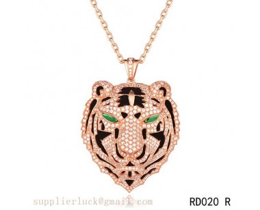 Panthere de Cartier Leopard head pendant in pink gold with emeralds and diamonds