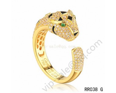 Cartier panther motif ring in yellow gold with diamonds emerald