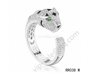 Cartier panther motif ring in white gold with diamonds emerald