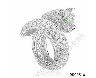 Cartier panther motif ring in white gold with diamonds emerald onyx