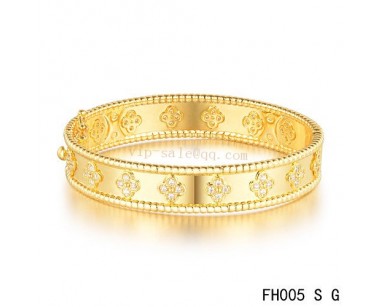 Van Cleef and Arpels Perlée clover bracelet/yellow gold/diamonds
