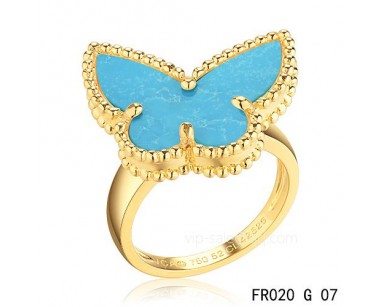 Van Cleef Alhambra ring<li>In yellow gold with turquoise replica