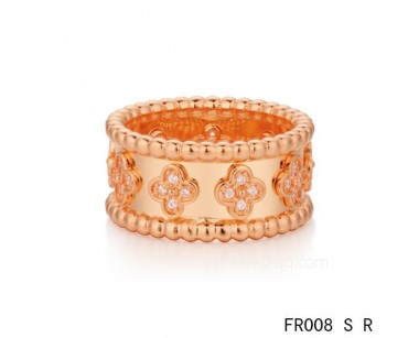 Van Cleef and Arpels clover ring<li>In pink with round diamonds