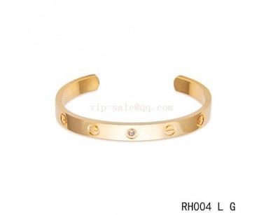 Open Cartier Love Bracelet in yellow gold with pink sapphire