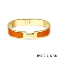 Hermes Clic H narrow Bracelet / enamel orange / yellow gold	