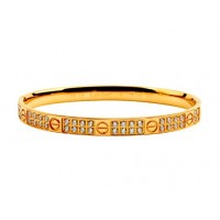 Cartier Love bangle bracelet in yellow gold with diamonds	