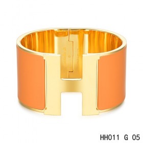 Hermes Clic H Extra-Large Bracelet / orange enamel / yellow gold