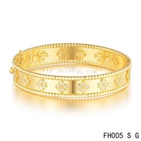 Van Cleef and Arpels Perlée clover bracelet/yellow gold/diamonds