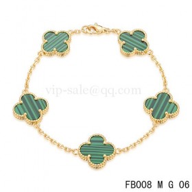 Van cleef & arpels braceletjaune avec 5 motifs de couleur verte