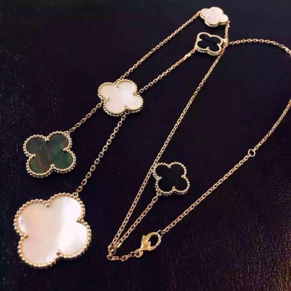 Van Cleef & Arpels Magic Alhambra necklace, 6 motifs, yellow gold, white and gray mother-of-pearl, onyx.