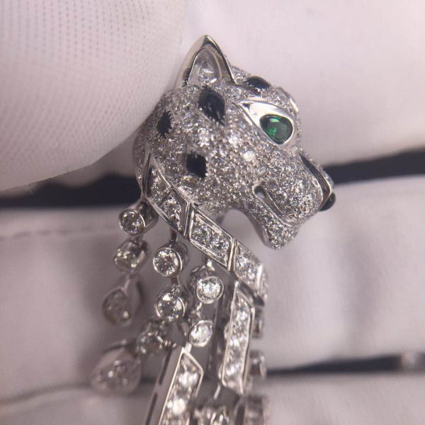 Panthère de Cartier Earrings, 950‰ platinum, 310 brilliant-cut diamonds totaling 5.63 carats, emeralds, onyx.